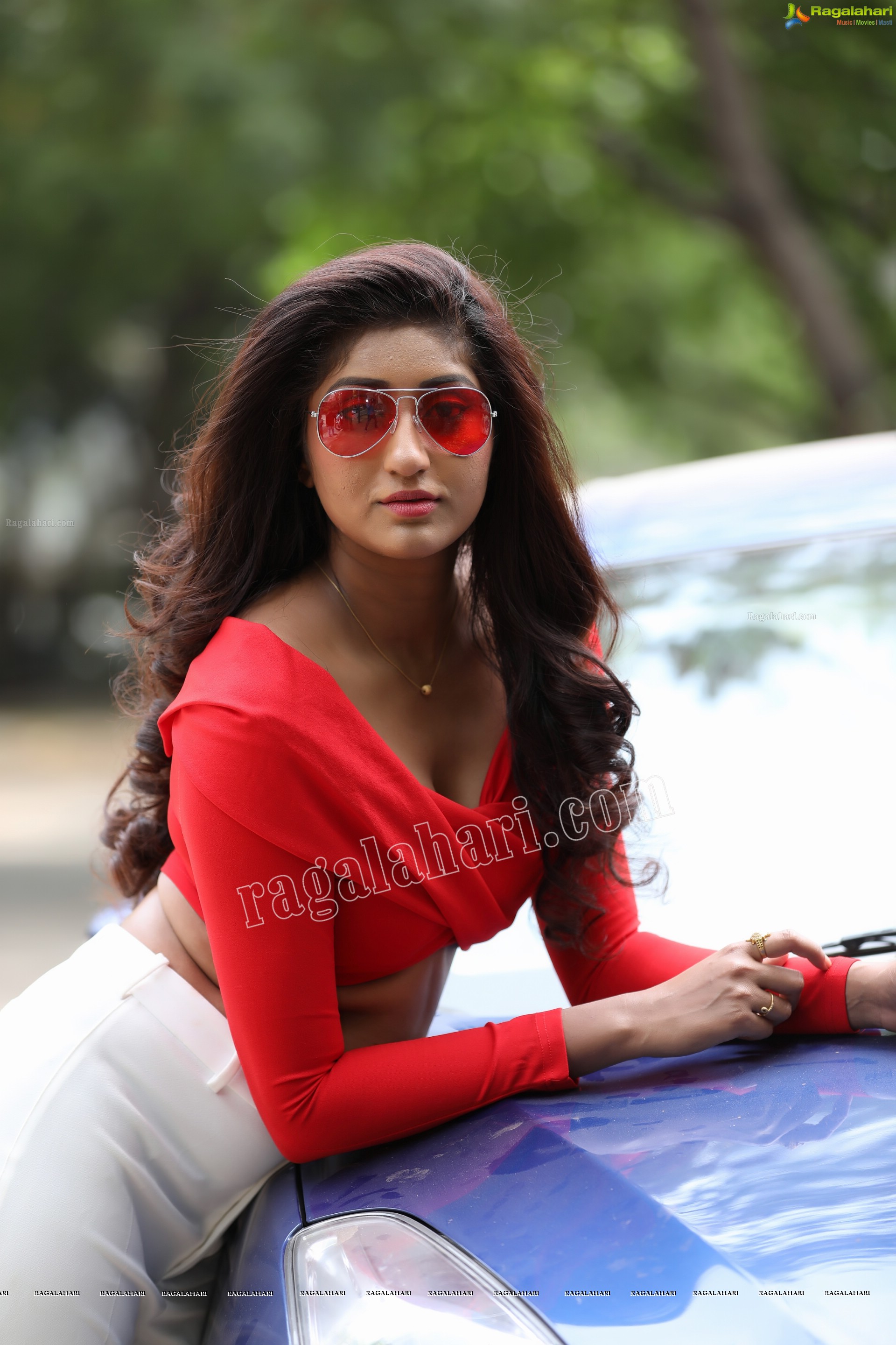 Sravani Yadav in Red Wrapped Top and White Pant Exclusive Photo Shoot