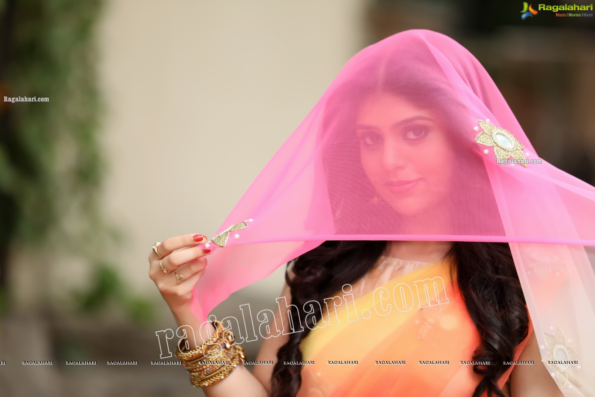 Viswa Sri Bandhavi in Pink and Orange Lehenga Choli Exclusive Photo Shoot