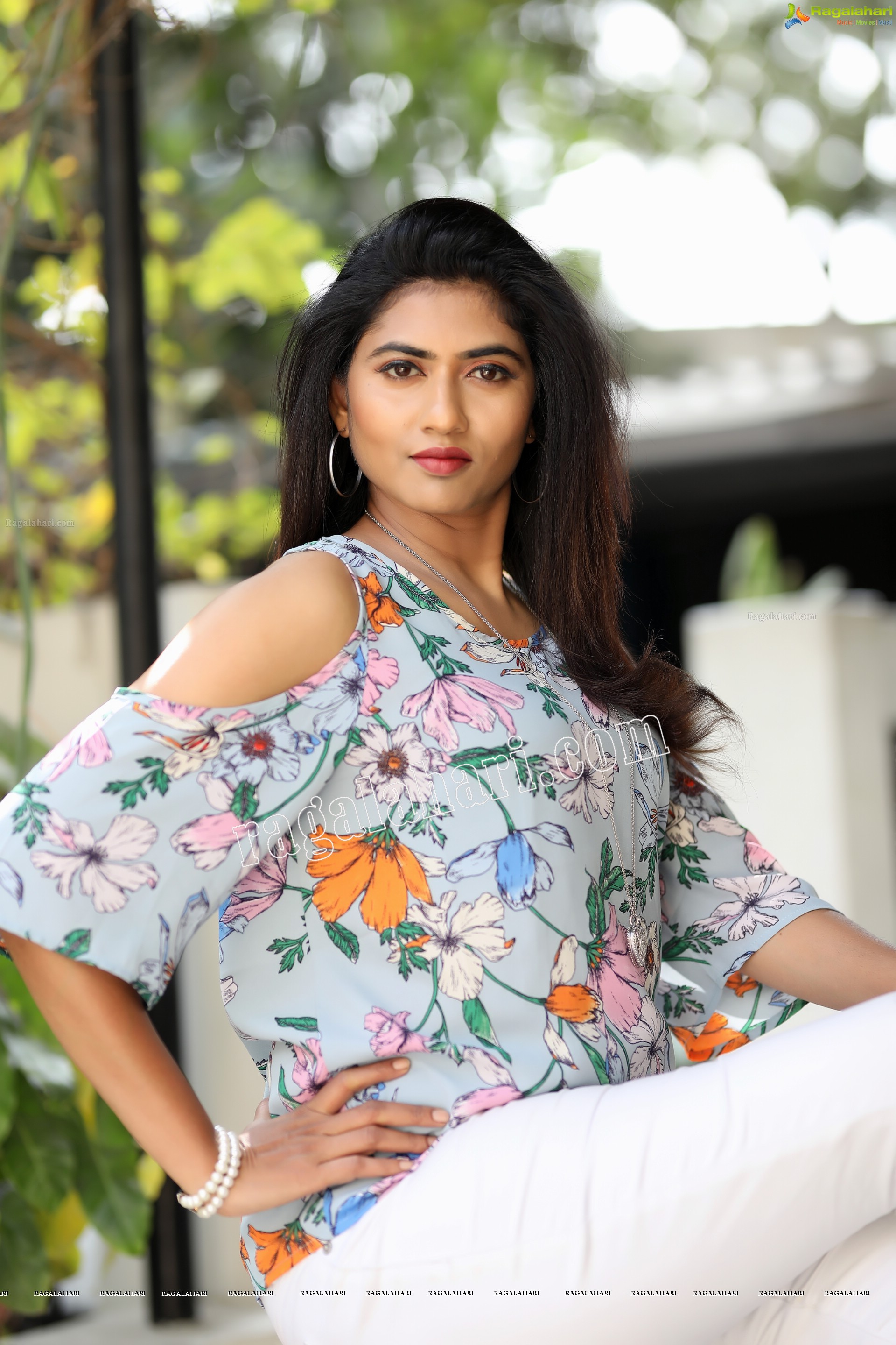 Raja Kumari YN in Pale Blue Floral Printed Top and White Jeans Exclusive Photo Shoot