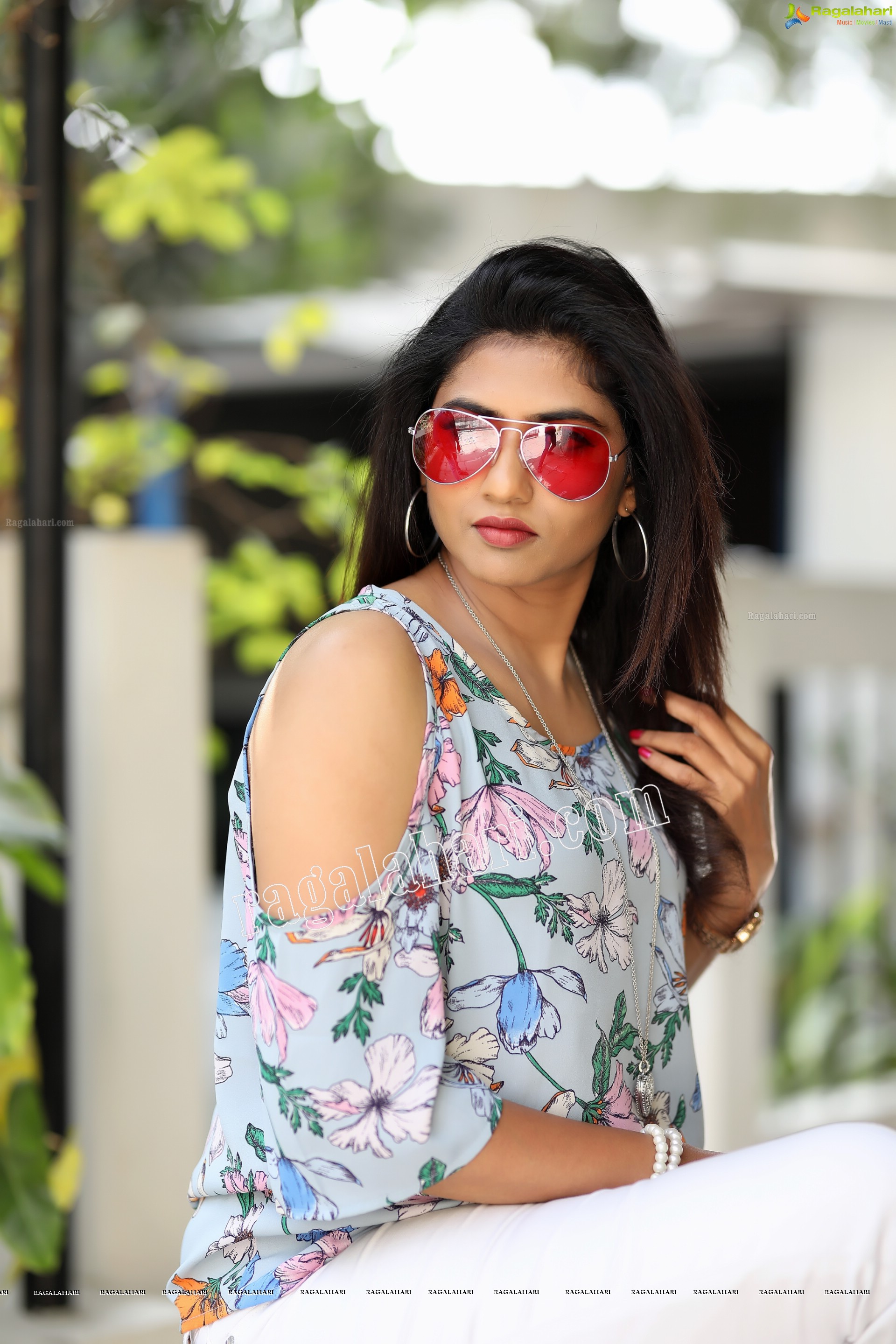 Raja Kumari YN in Pale Blue Floral Printed Top and White Jeans Exclusive Photo Shoot