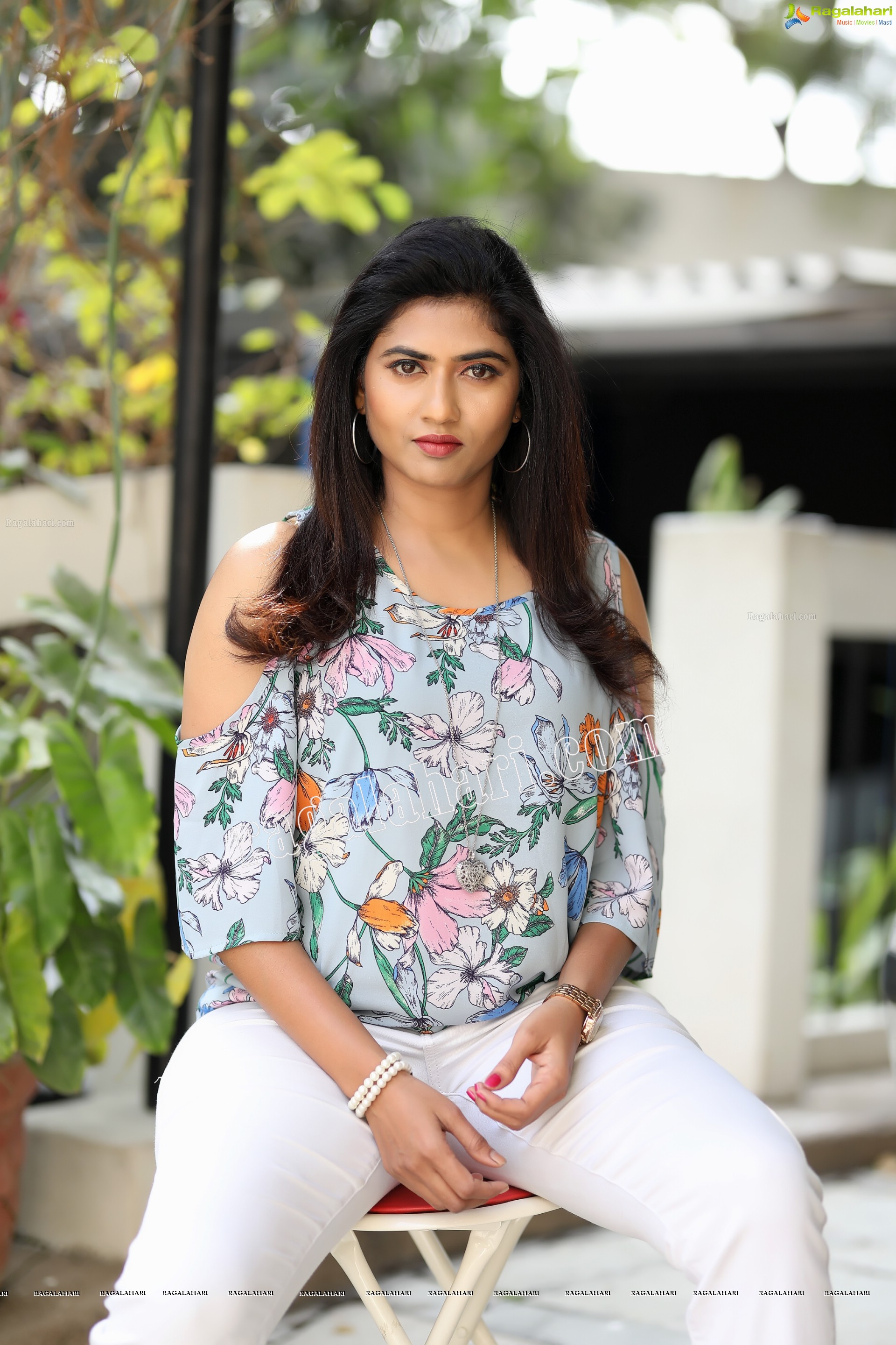 Raja Kumari YN in Pale Blue Floral Printed Top and White Jeans Exclusive Photo Shoot