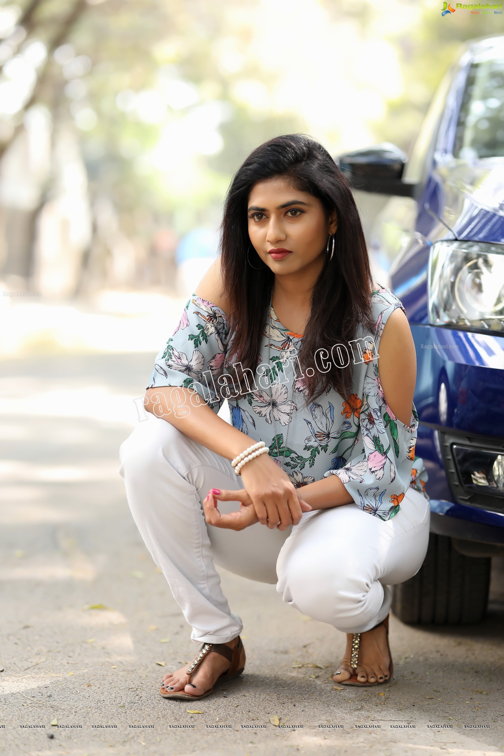Raja Kumari YN in Pale Blue Floral Printed Top and White Jeans Exclusive Photo Shoot