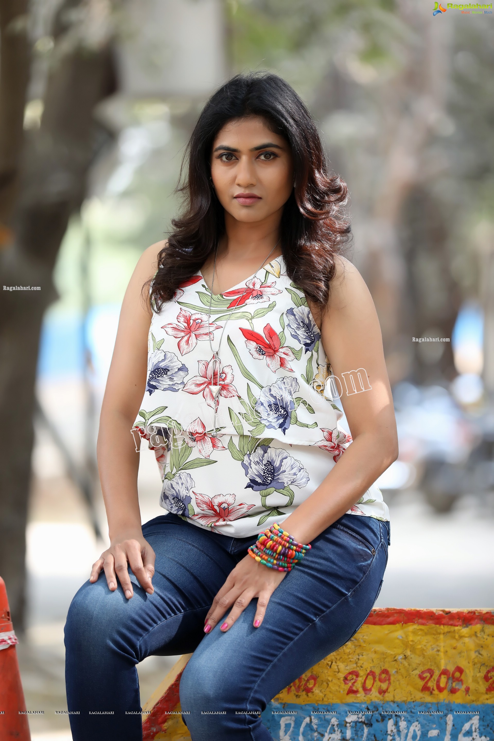 Raja Kumari YN in White Floral Printed Top and Jeans Exclusive Photo Shoot