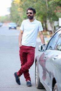 Kiran Talasila Poses in Style With a Car
