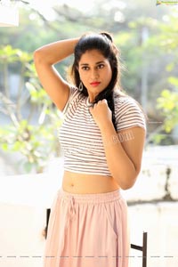 Akhila Ram in Pastel Pink Skirt and Stripes Top