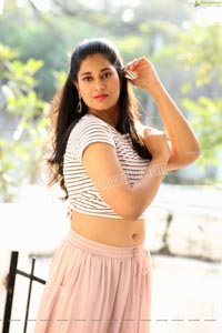 Akhila Ram in Pastel Pink Skirt and Stripes Top