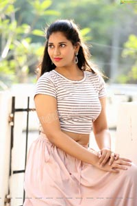 Akhila Ram in Pastel Pink Skirt and Stripes Top