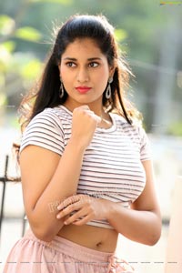 Akhila Ram in Pastel Pink Skirt and Stripes Top