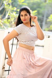 Akhila Ram in Pastel Pink Skirt and Stripes Top