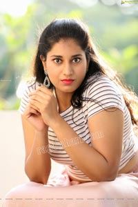 Akhila Ram in Pastel Pink Skirt and Stripes Top