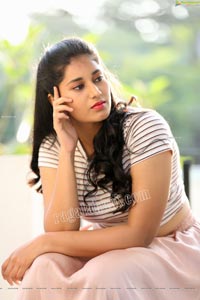 Akhila Ram in Pastel Pink Skirt and Stripes Top