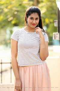 Akhila Ram in Pastel Pink Skirt and Stripes Top