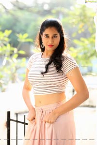 Akhila Ram in Pastel Pink Skirt and Stripes Top