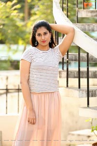 Akhila Ram in Pastel Pink Skirt and Stripes Top