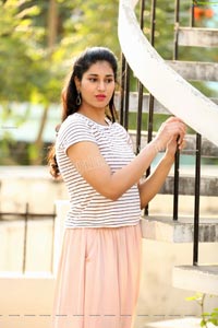 Akhila Ram in Pastel Pink Skirt and Stripes Top