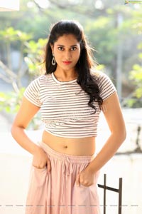 Akhila Ram in Pastel Pink Skirt and Stripes Top