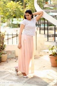 Akhila Ram in Pastel Pink Skirt and Stripes Top