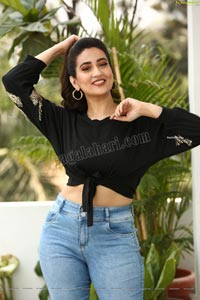 Manjusha in Black Tie Front Top and Jeans