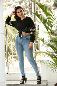 Manjusha in Black Tie Front Top and Jeans