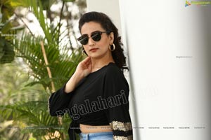 Manjusha in Black Tie Front Top and Jeans