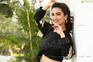 Manjusha in Black Tie Front Top and Jeans