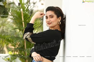 Manjusha in Black Tie Front Top and Jeans