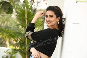 Manjusha in Black Tie Front Top and Jeans