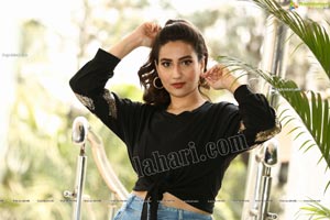 Manjusha in Black Tie Front Top and Jeans