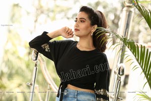 Manjusha in Black Tie Front Top and Jeans