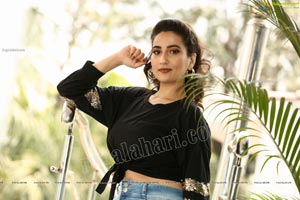 Manjusha in Black Tie Front Top and Jeans