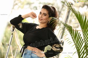 Manjusha in Black Tie Front Top and Jeans