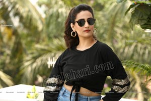 Manjusha in Black Tie Front Top and Jeans