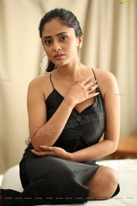 Sanya Thakur in Black Spaghetti Strap Satin Dress