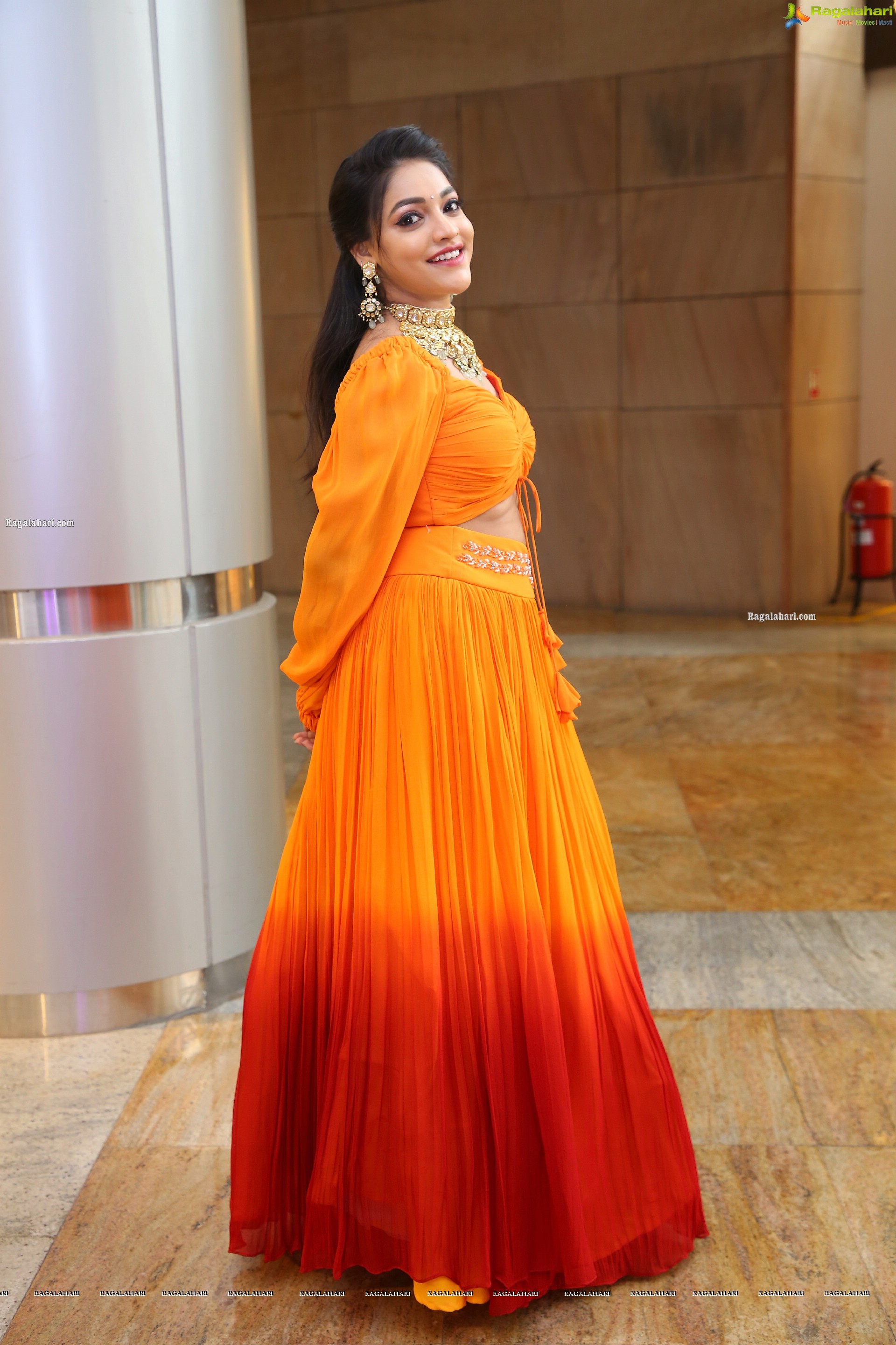 Ishwarya Vullingala in Orange Embellished Lehenga Choli, HD Photo Gallery