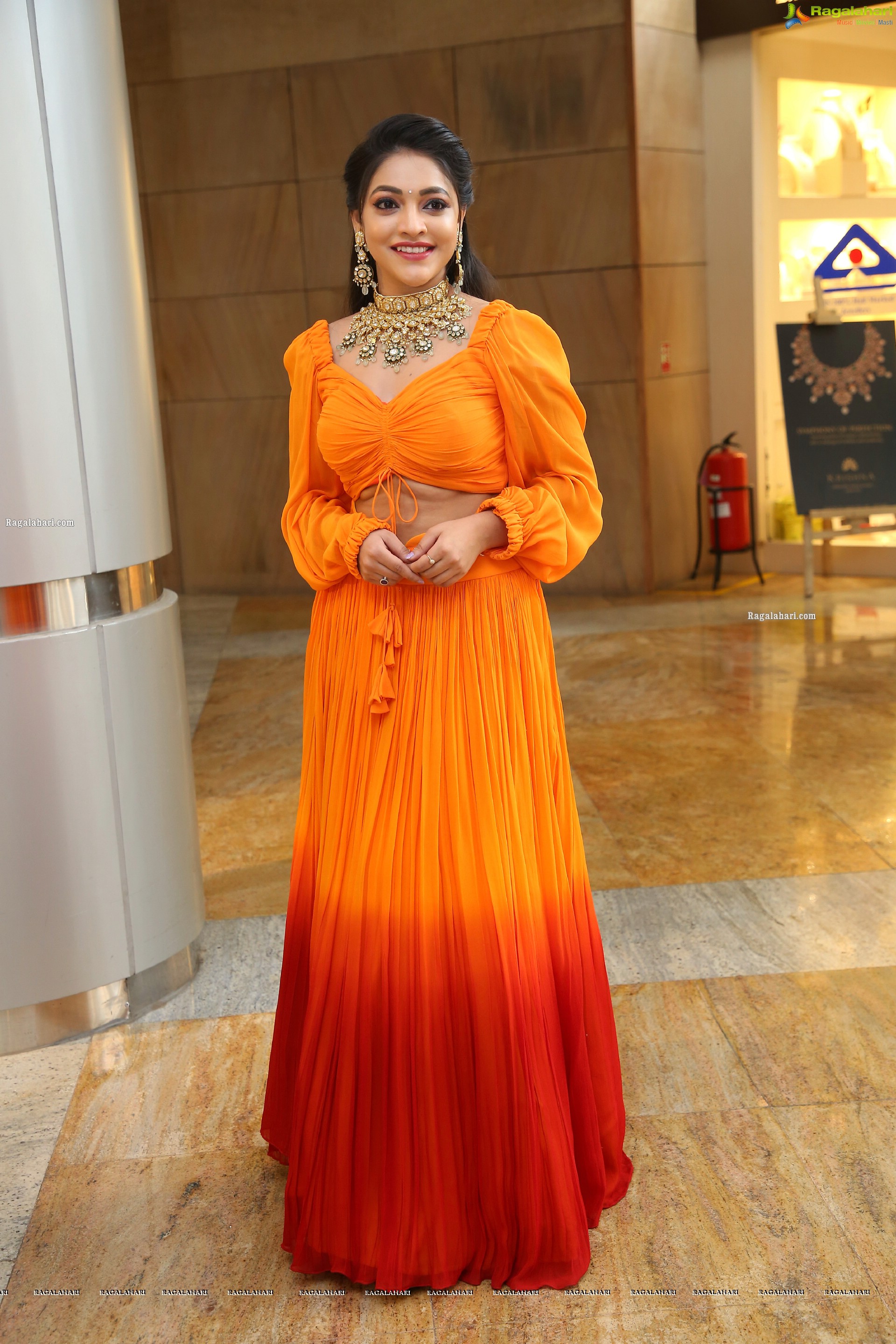 Ishwarya Vullingala in Orange Embellished Lehenga Choli, HD Photo Gallery