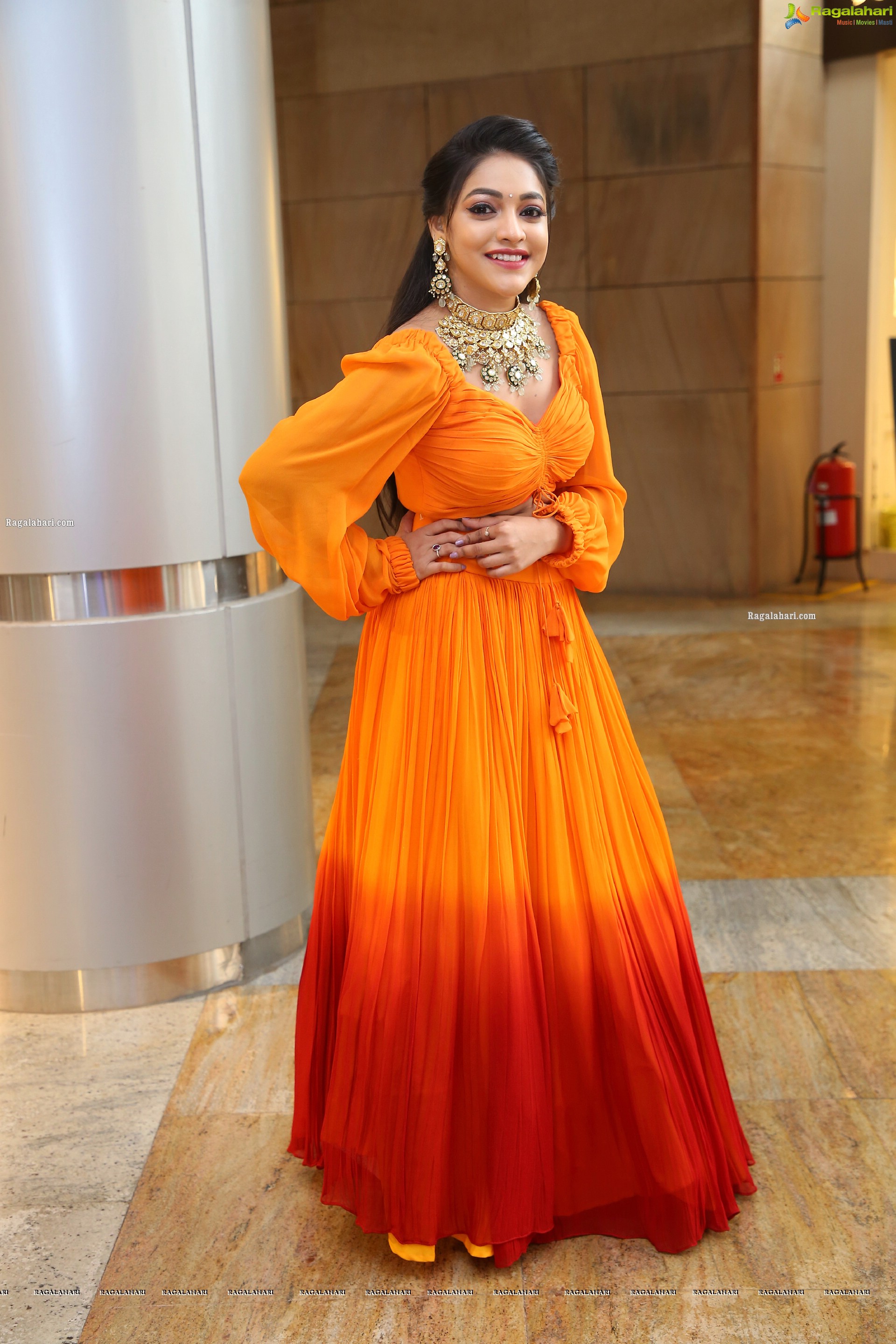 Ishwarya Vullingala in Orange Embellished Lehenga Choli, HD Photo Gallery