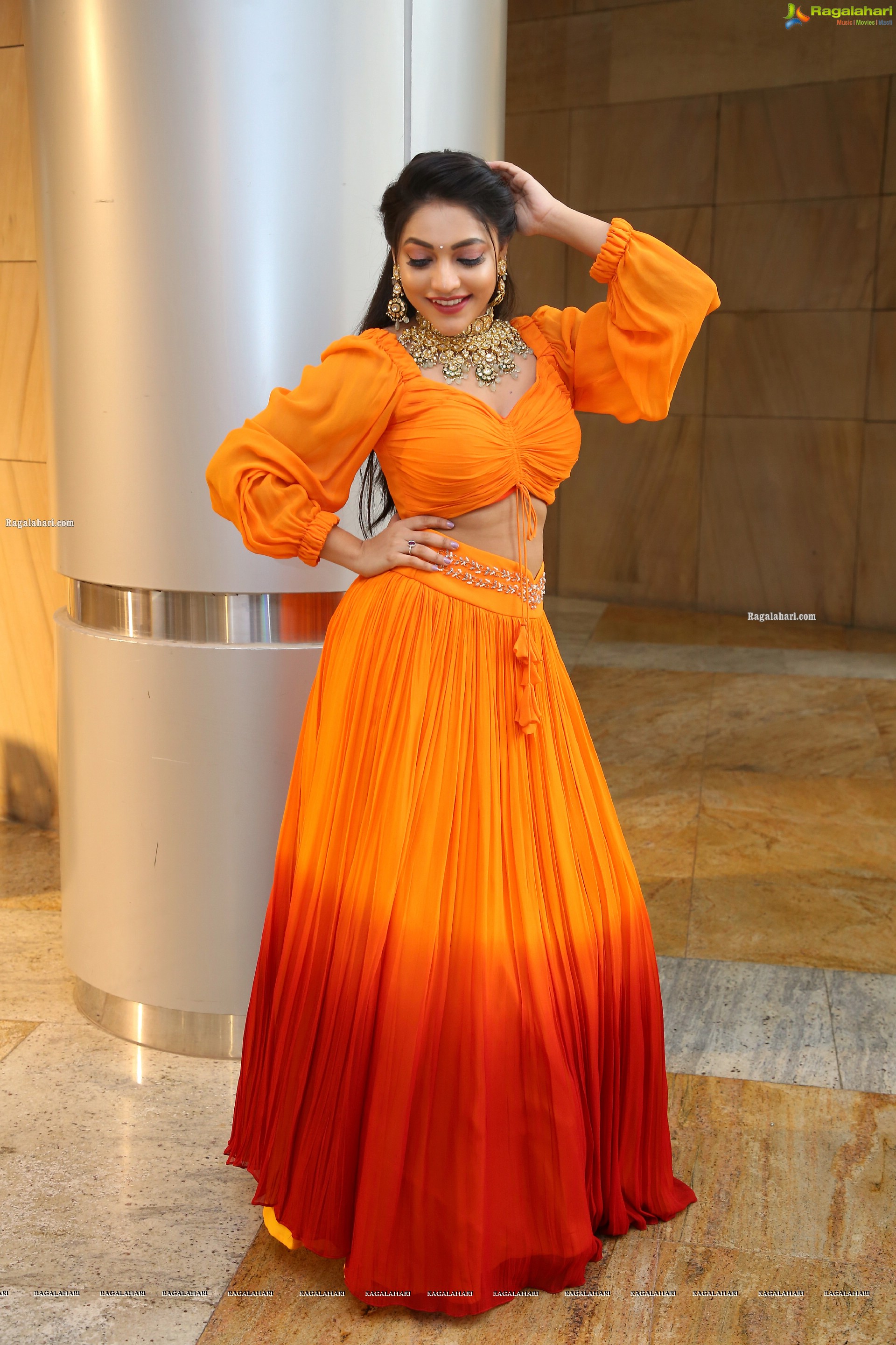 Ishwarya Vullingala in Orange Embellished Lehenga Choli, HD Photo Gallery
