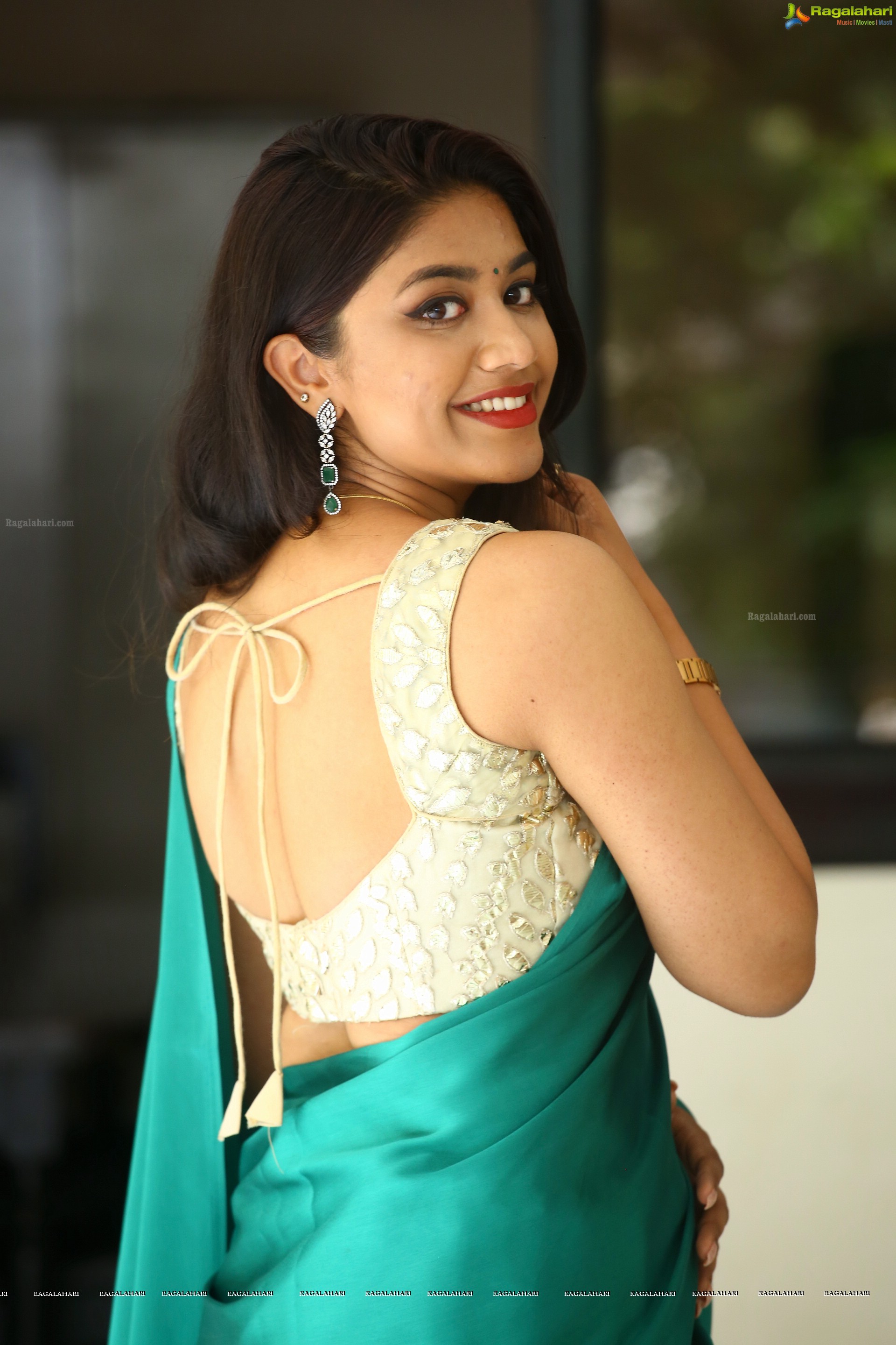 Malavika Satheesan at Bommala Koluvu Movie Press Meet