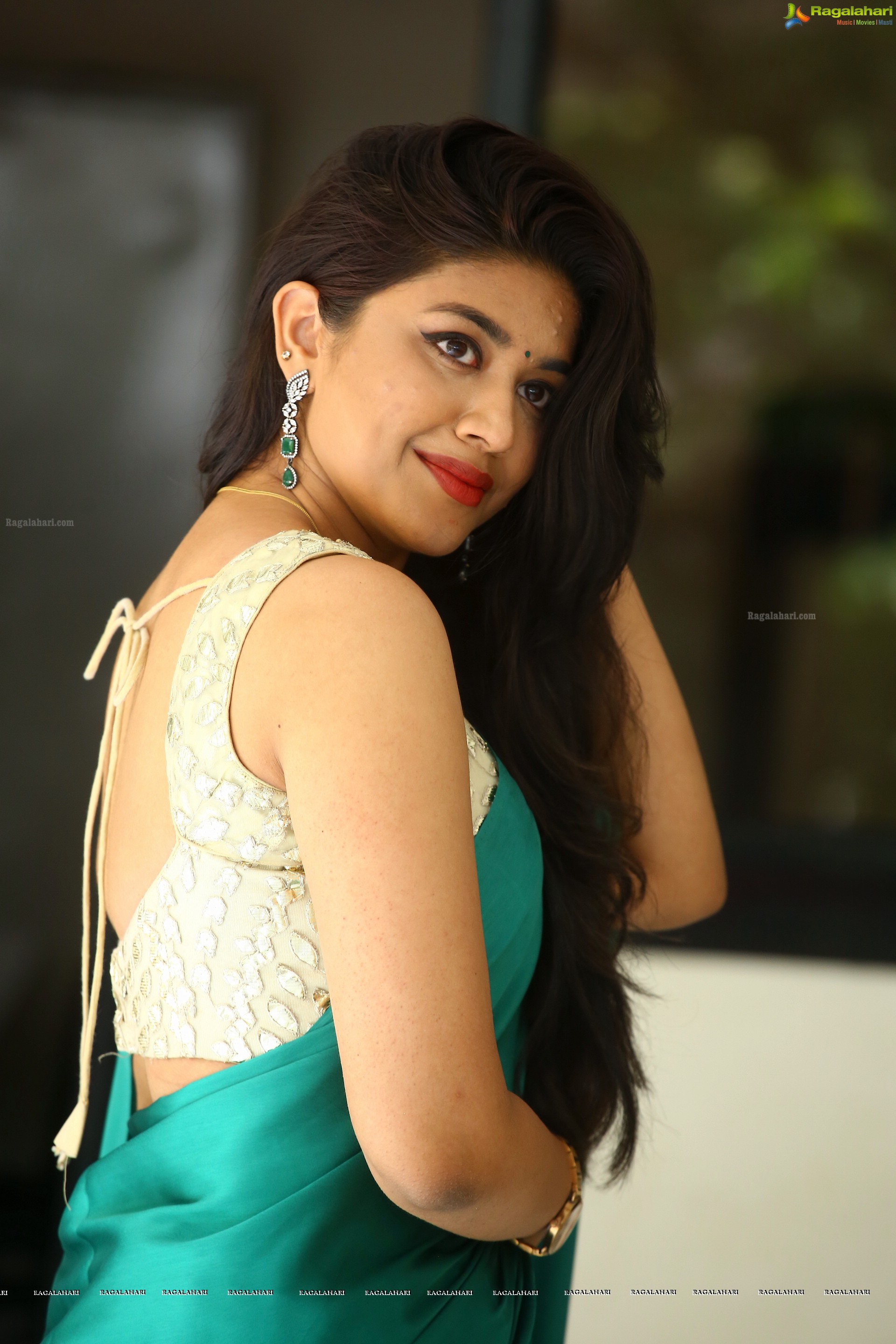 Malavika Satheesan at Bommala Koluvu Movie Press Meet