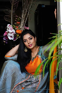 Aadhya Paruchuri in Gray and Orange Anarkali Suit