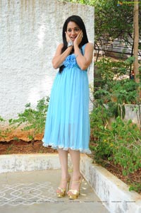 Reshma in Sleeveless Cool Blue Dress+