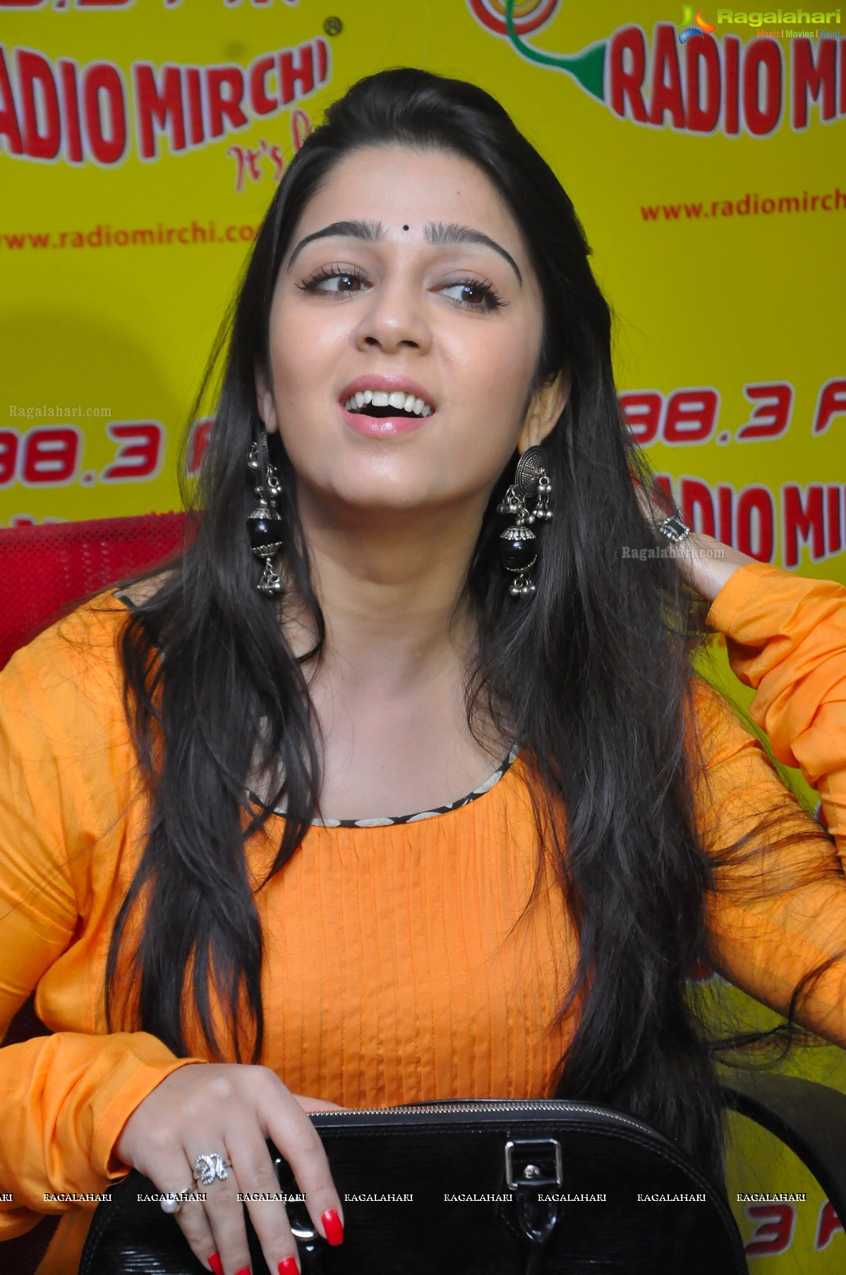 Charmme at Radio Mirchi for Prema Oka Maikam Audio Release, Photo Gallery