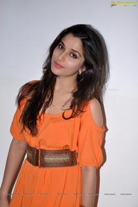 Madhhurima in Orange Gown