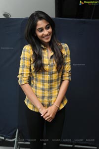 Regina Cassandra in Yellow Shirt