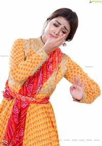 Shriya Saran in Dance Poses