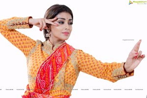 Shriya Saran in Dance Poses