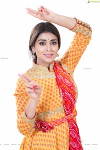 Shriya Saran in Dance Poses