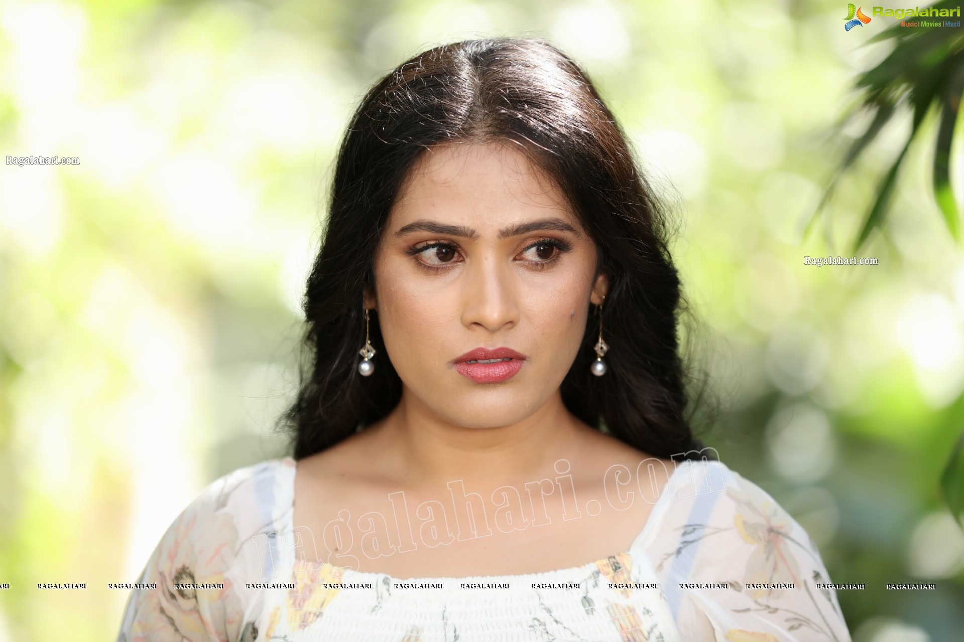 Anusha Parada in Pink Skirt and White Floral Top Exclusive Photo Shoot