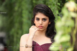 Viswa Sri Bandhavi in Burgundy Strapless Gown with Bolero