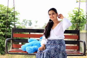 Vaanya Aggarwal in Blue Printed Maxi Skirt and White Top